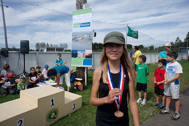 girl with racing medal