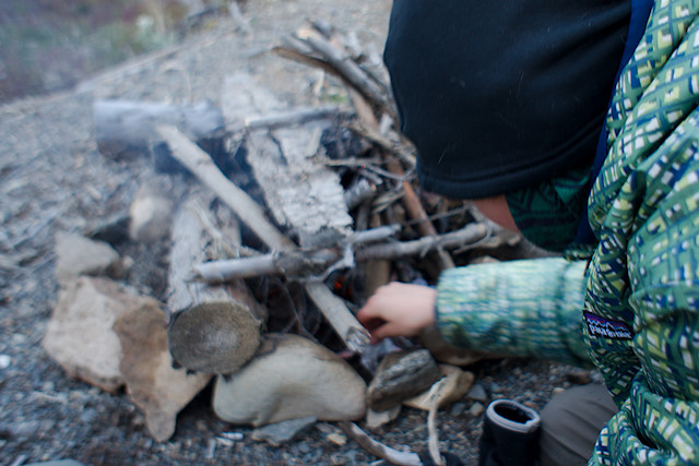 boy lighting fire