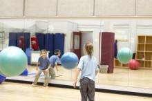 kids play with exercise balls