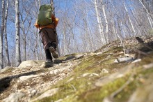 girl hikes on path